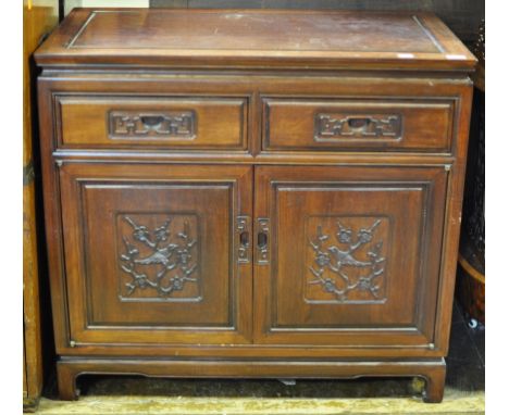 A Chinese sideboard, with two frieze drawers and two panel doors, 88.5 cm wide