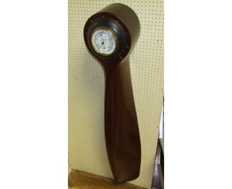 A wooden propeller section, inset a barometer, 152 cm high