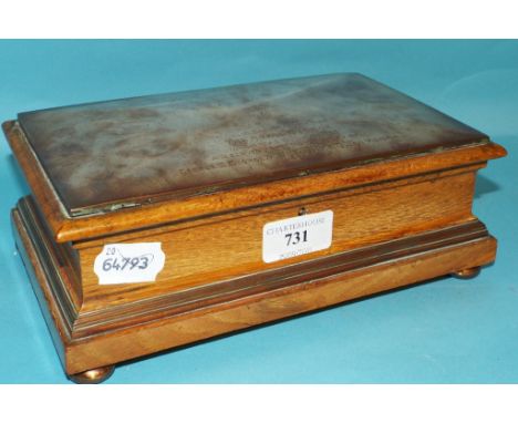 A copper and oak box, made from material from The Royal George, which served as the Royal Yacht of George III, IV, William IV