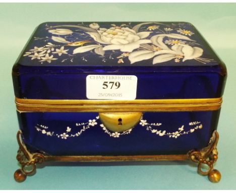 A blue glass box, decorated birds, flowers and foliage in enamel, with gilt metal mounts (a.f.), 18 cm wide Condition report 