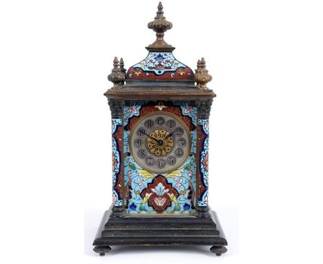A French mantel clock, the 6 cm diameter silvered dial with Arabic numerals, fitted an eight day movement, striking on a gong