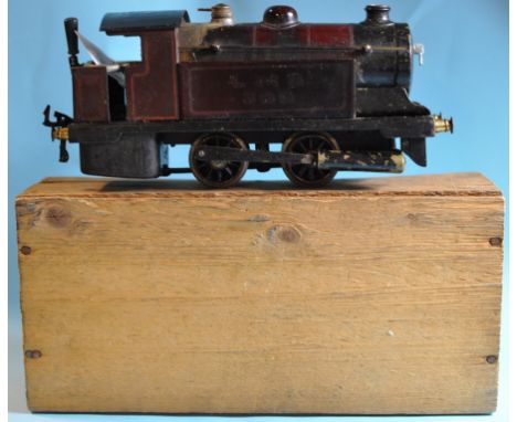 A Bowman 0 gauge live steam tank locomotive, 0-4-0, 300, in LMS livery, boxed Condition report Report by GH

Various chips, w