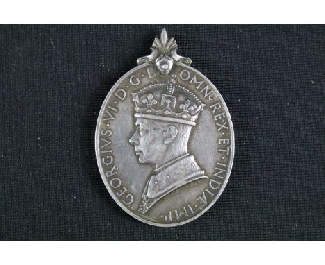 A British full size King George VI Territorial Efficient Service Medal, named and issued to 7896114. CPL. L.A. Tompkins of th