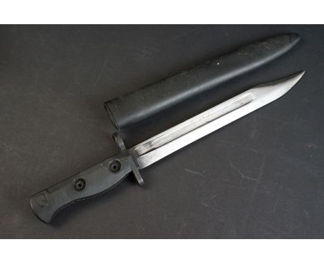 A British military issued L1A1 bayonet, broad arrow mark to blade, black handle / grip, complete with black scabbard.