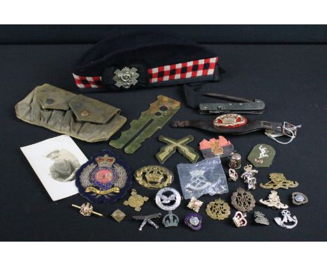 A collection of mixed military collectables to include a military issued Encore Jack knife by T. Turner &amp; Co. with War De