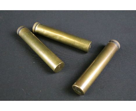 A collection of three British military issued Lee Enfield .303 rifle oilers, brass construction and all stamped with the Brit