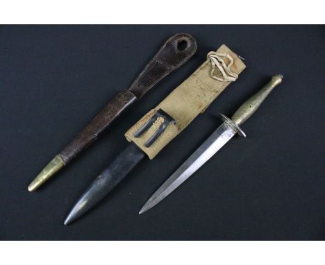A Fairbairn Sykes commando fighting knife, blade marked Wilkinson Sword London to one side and The F.S Fighting Knife to the 