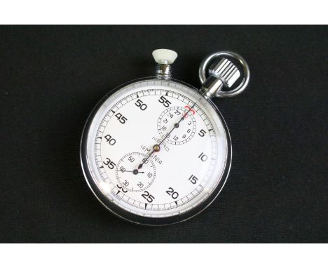 A vintage 1960's British military issued Lemania stop watch, white dial with two sub dials, broad arrow marked to verso.