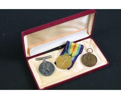 Three First World War full size British service medals to include a pair issued to 32382 PTE. W. Britton R. War. R. (war meda