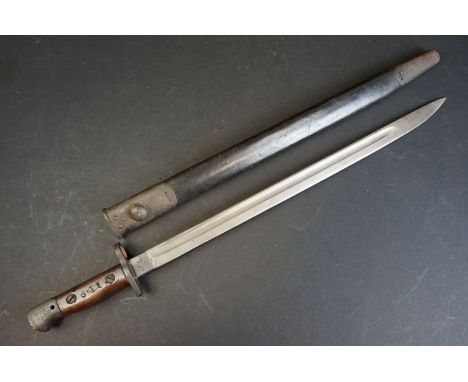 A World War One / WW1 British 1907 pattern bayonet complete with leather scabbard, blade maker marked Wilkinson, blade measur