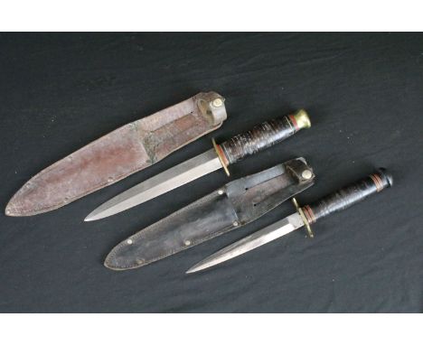 Two vintage double edged hunting / scouting sheath knives, both Sheffield made to include a Aitkinson Brothers and a Southern
