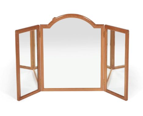 Mouseman: A Robert Thompson of Kilburn English Oak Winged Mirror, the centre with an arched top, all with castellated top, wi