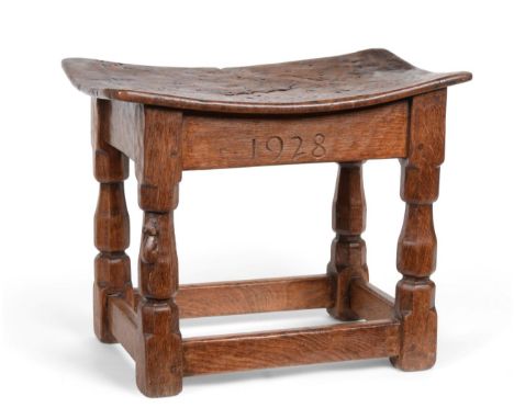 Mouseman: A Robert Thompson of Kilburn Burr Oak Dish Top Stool, dated 1928, on four octagonal legs joined by stretchers, with