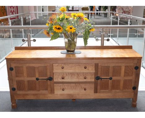 Mouseman: A Robert Thompson of Kilburn Panelled English Oak 6ft Sideboard, with raised upstand over two cupboard doors, with 