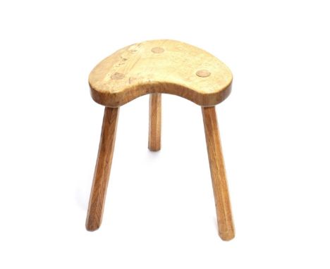 Mouseman: A 1940's Robert Thompson of Kilburn English Oak Cow Stool, the kidney shaped seat on three octagonal legs, with car