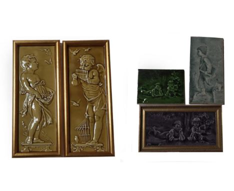Two Craven Dunnill &amp; Co Limited Rectangular Plaques, moulded with a cherub and a child, mustard glaze, stamped CRAVEN DUN