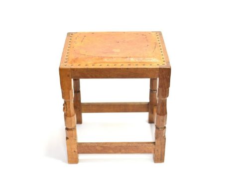 Mouseman: A Robert Thompson of Kilburn English Oak Dressing Table Stool, circa 1950's/60's, with upholstered cow hide seat, o