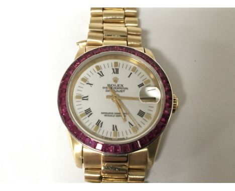 A Ladies 18carat Gold Midi Rolex, Oyster Perpetual DateJust Superlative Chronometer. With a pink sapphire outer bezel. Seen w