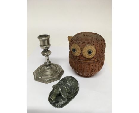 A small octagonal shape silver plated candlestick, a soapstone type scarab beetle and an owl