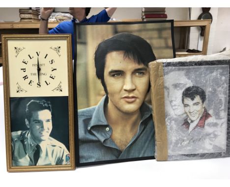 A collection of Elvis pictures including a large canvas print.