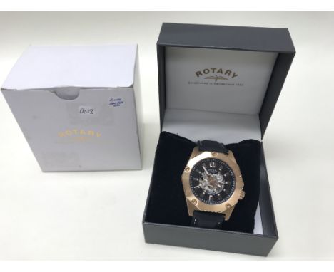 A boxed Rotary gents automatic precision skeleton wristwatch.
