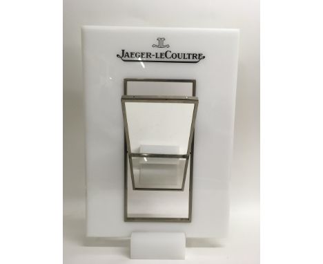 A Jaeger-LeCoultre advertising display mirror having perspex frame enclosing articulated mirror section.Approx 35.5x53cm