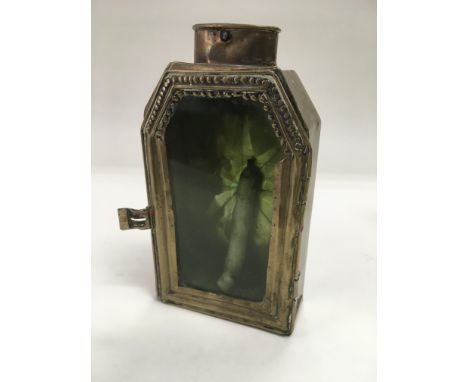 A brass cased travelling candle hand lamp, approx 14cm.