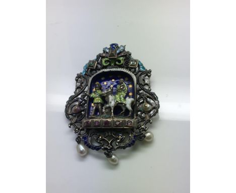 A  fine Victorian silver  and enamel pendant  inset with rubies diamonds and emeralds with drop pearls depicting Jesus escape