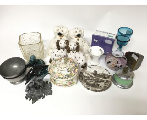 A collection of various ceramic and other items including ceramic dogs, pewter bowls, a glass vase etc.