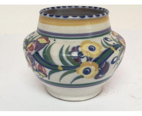 A Carter Stabler Adams Poole pottery vase with floral decoration. Height 11cm.