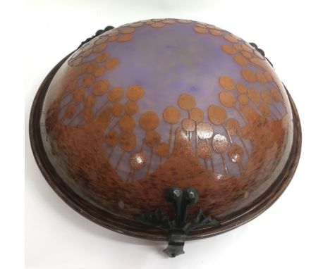 A large Art Nouveau glass dome shaped ceiling light of mottled mauve colour overlaid with orange flowers.Approx 49.5cm