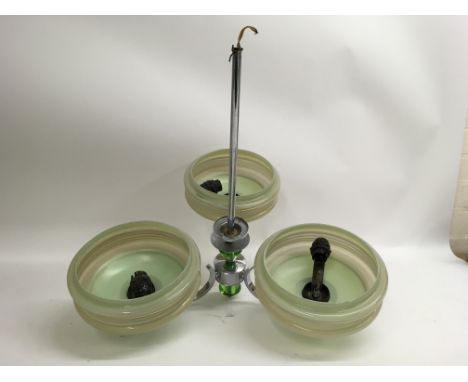 An Art Deco chrome and glass light fitting, some slight damage to the glass