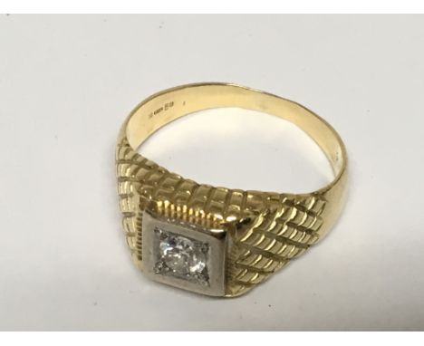 An 18ct Gold ring set with a brilliant cut diamond ring size U.