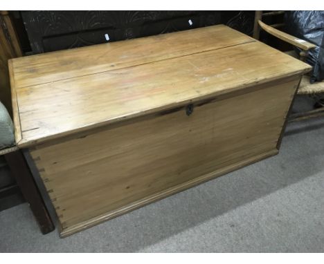A pine trunk, approx 98cm x 54cm x 43cm.