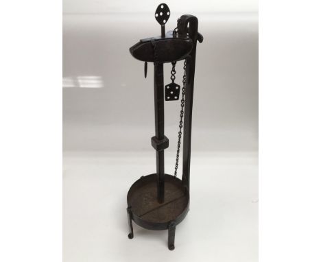 A circa 1820 German iron crusie lamp, approx 52cm.