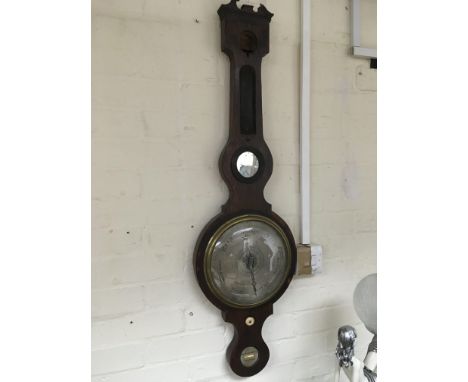 A rosewood wall barometer in need of restoration.