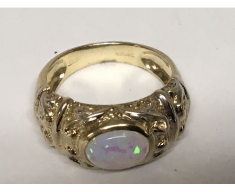 A 9carat Gold ring set with an opal ring size P. Weight 4.5g