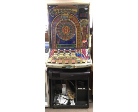 A 2002 Barcrest Goldne Dragon Club fruit machine with a jackpot of 100, in need of restoration. Sold as not working.