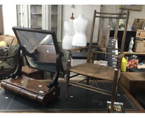 An Early Victorian Mahogany dressing mirror a rush seated chair and an open stick stand. (3)