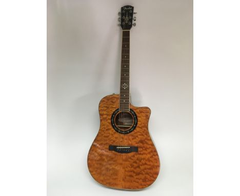 A Fender semi acoustic guitar, model T Bucket 300 CE AMB. Comes supplied with a soft carry case.