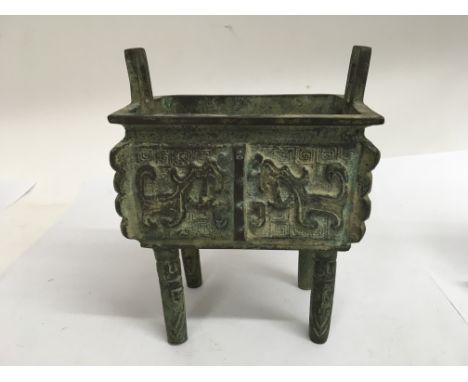 A Chinese bronze censer on stilt legs with Buddhism symbols 12 cm