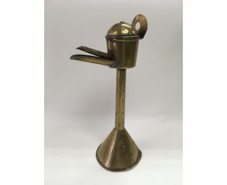 A circa 1800 brass standing double whale lamp, approx 31cm.