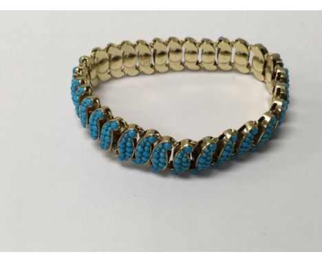 A Victorian gold turquoise expanding bracelet with enamel details to links marked 1841 whith maker