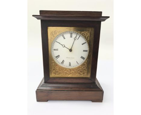 A Henry Marc of Paris mantel clock with Roman numerals.