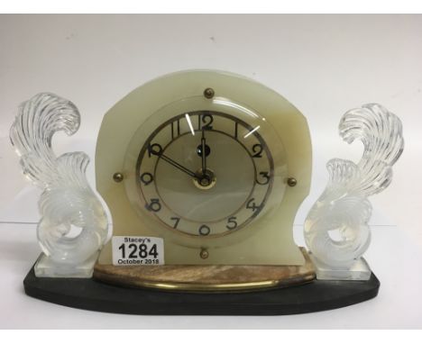 An Art Deco mantle clock with Sabino glass type sidepieces, approx 17.5x28cm