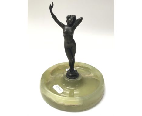A bronze figure of a nude maiden on an onyx ashtray base. Height approx 16cm.