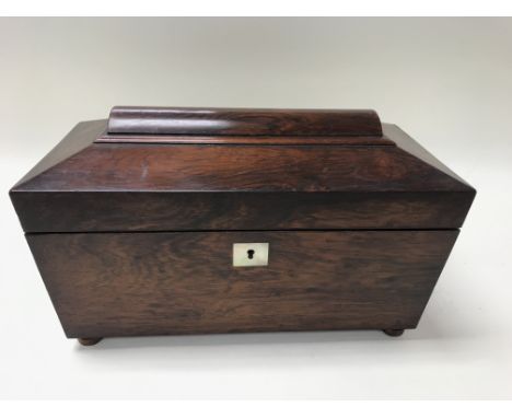 A tea caddy with two compartments and a glass mixing bowl.