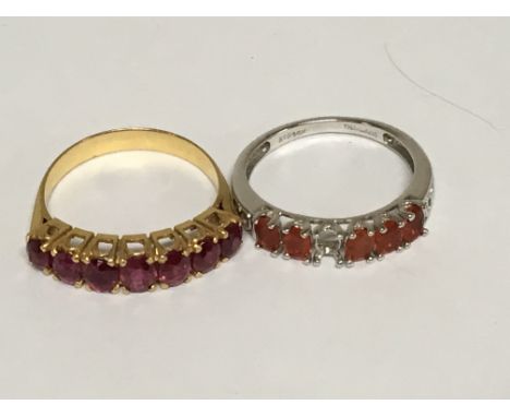 A 14carat white gold Gold ring set with coloured stones one stone missing. And one other Gold ring. (2)