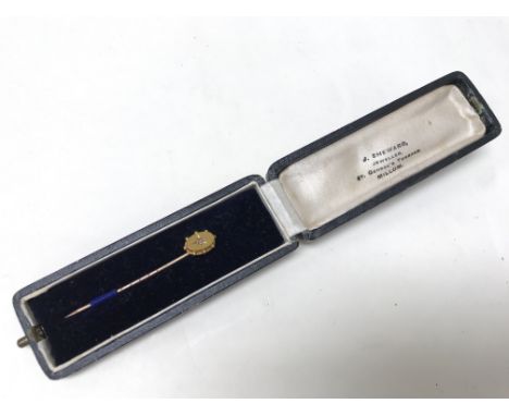 A 15ct gold tie pin, the oval top illusion set solitaire diamond in original retailers case. Weight approx 1g