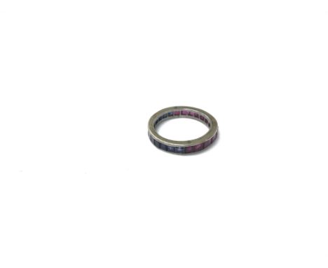 A ruby and sapphire platinum central section of a flip ring. Size approx P, weight approx 2.6g